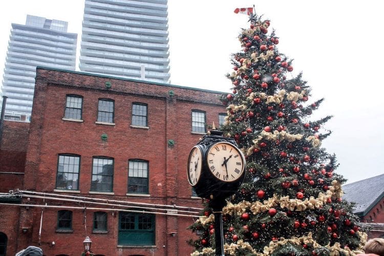 A Christmas tree and old clock in the Distillery District
