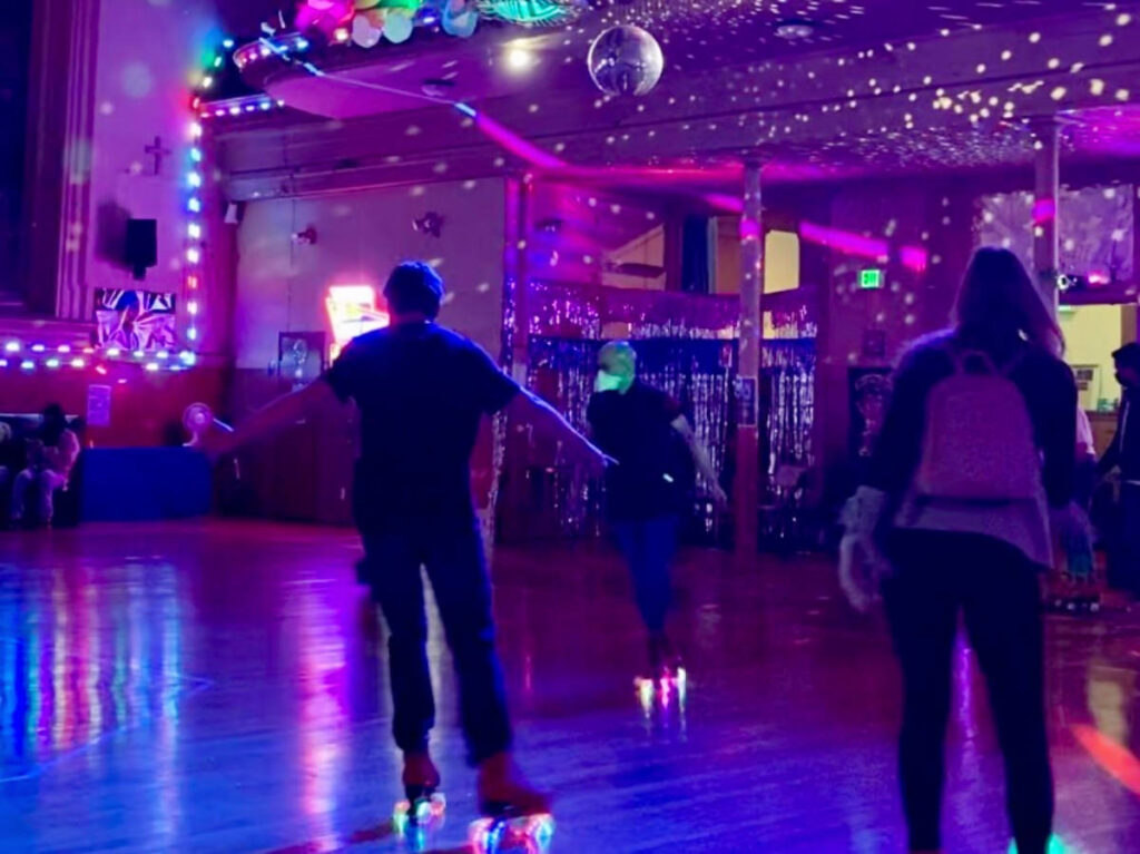 People enjoying roller skating in Church of 8 Wheels