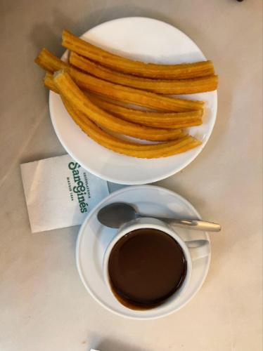 Closeup look of the churros and hot chocolate at Chocolateria San Gines
