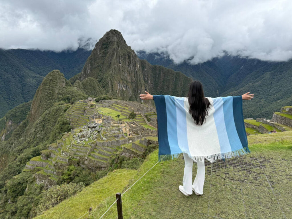 Travel Lemming writer Clara Kessler, admiring the overlooking view at Machu Picchu
