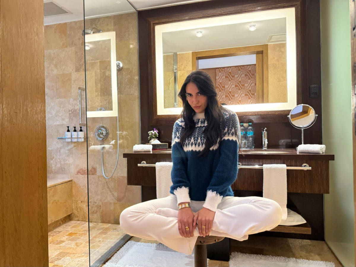 Clara loved getting ready on the vanity’s stool