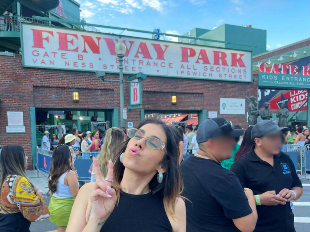 Author Claudicet Pena posing at the Fenway Park before a concert