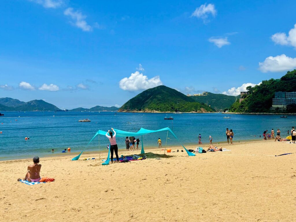 People swimming and sun-bathing at Clearwater Bay Second Beach
