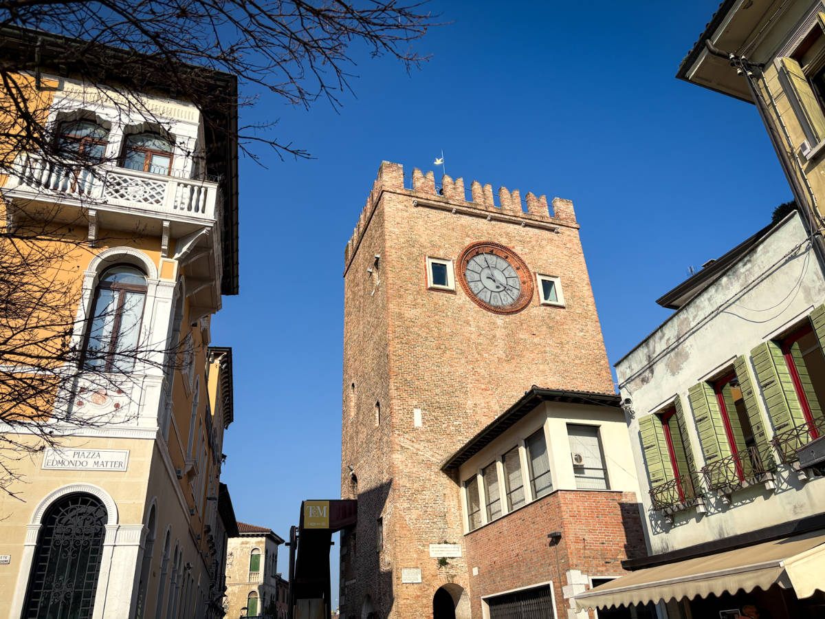 View of the clock tower against the clear blue sky in Mestre