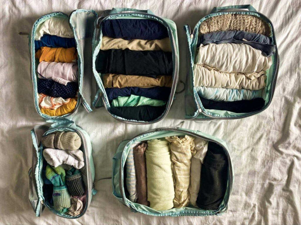 Variety of clothes packed on the packing cubes