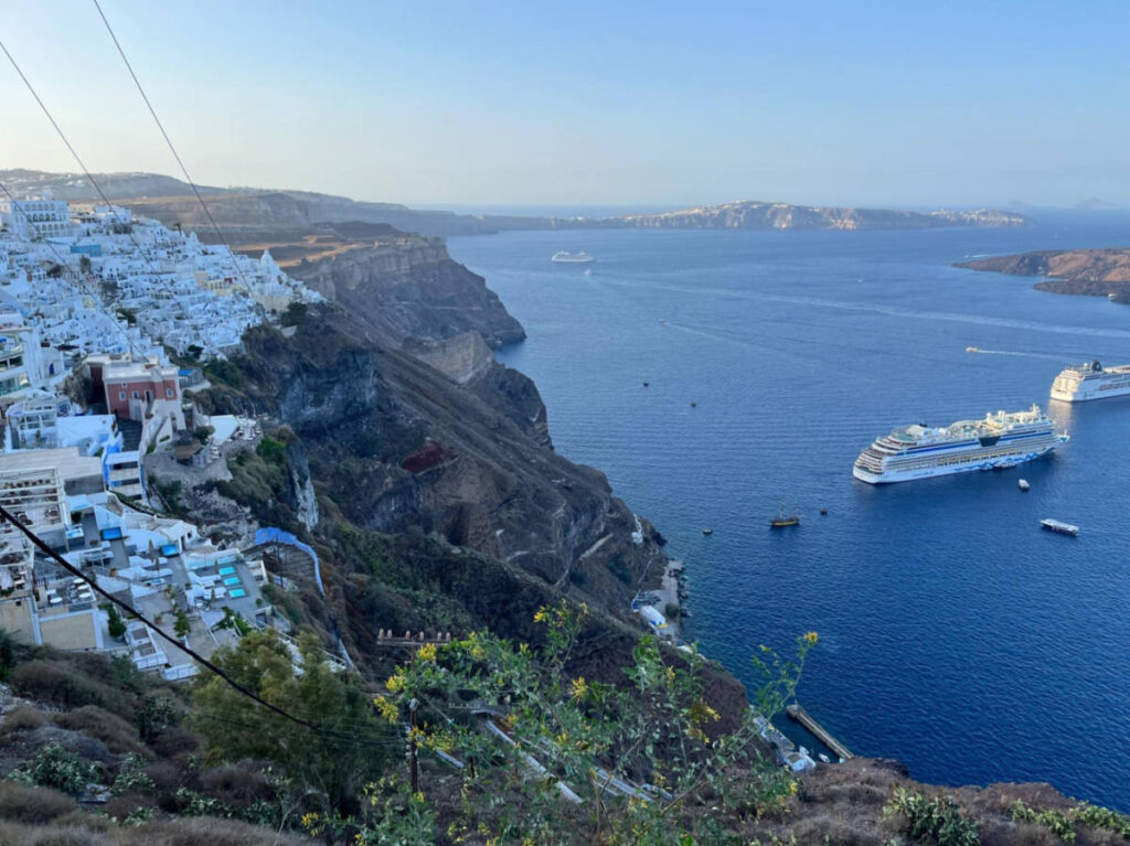 Overlooking coastal views and whitewashed cave houses in Fira