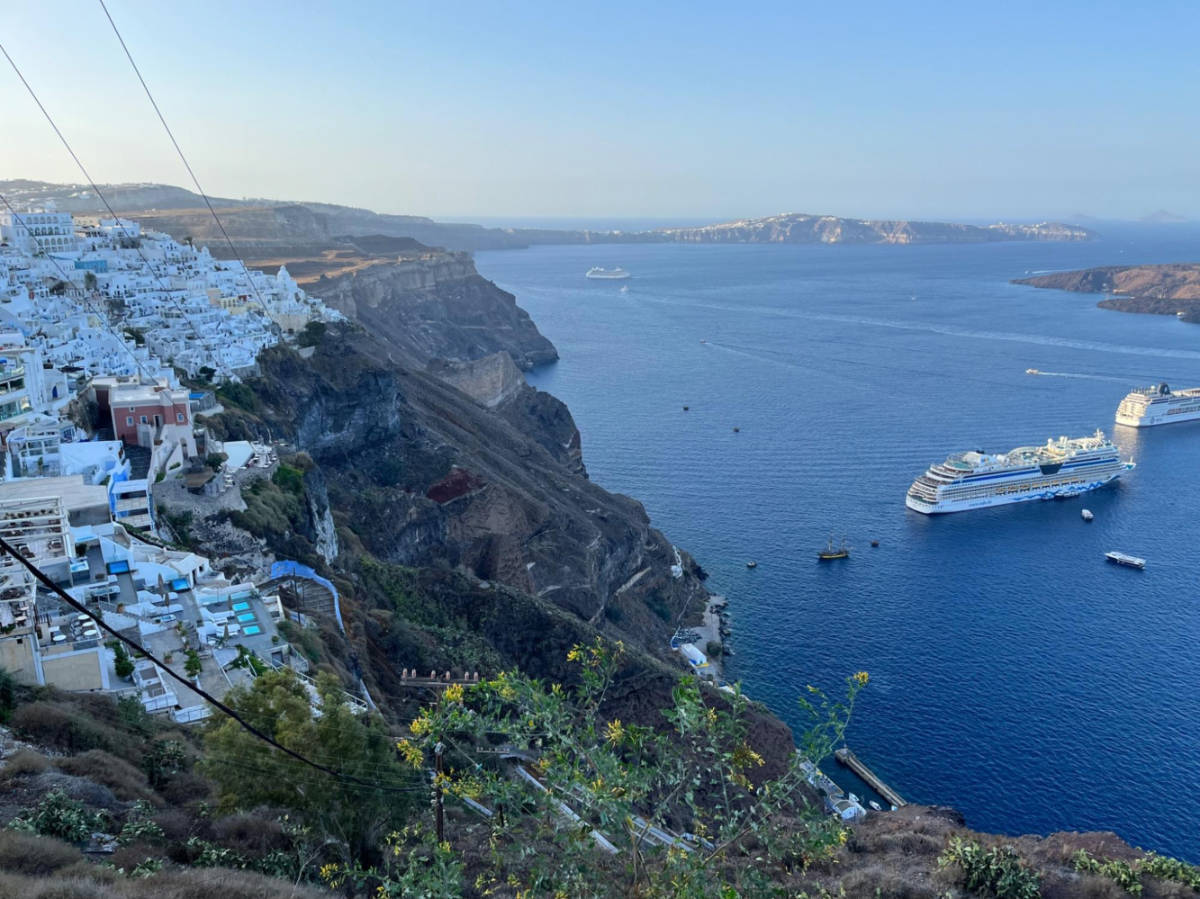 Overlooking coastal views and whitewashed cave houses in Fira