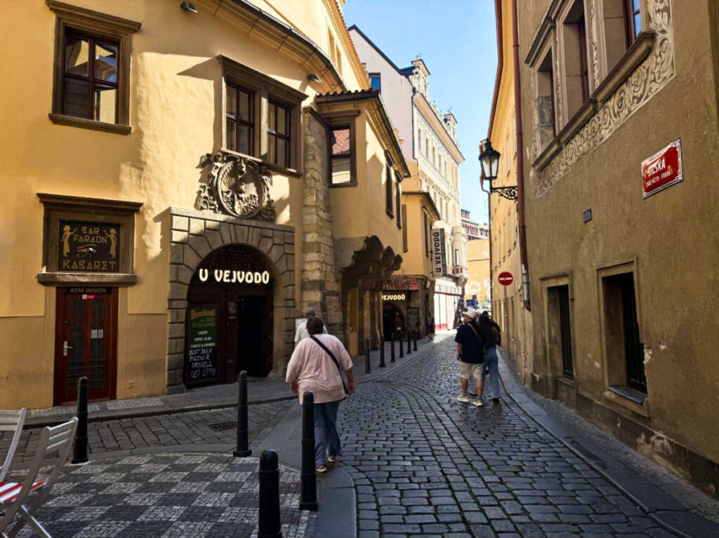 People walking along the cobblestone streets in the Old Town