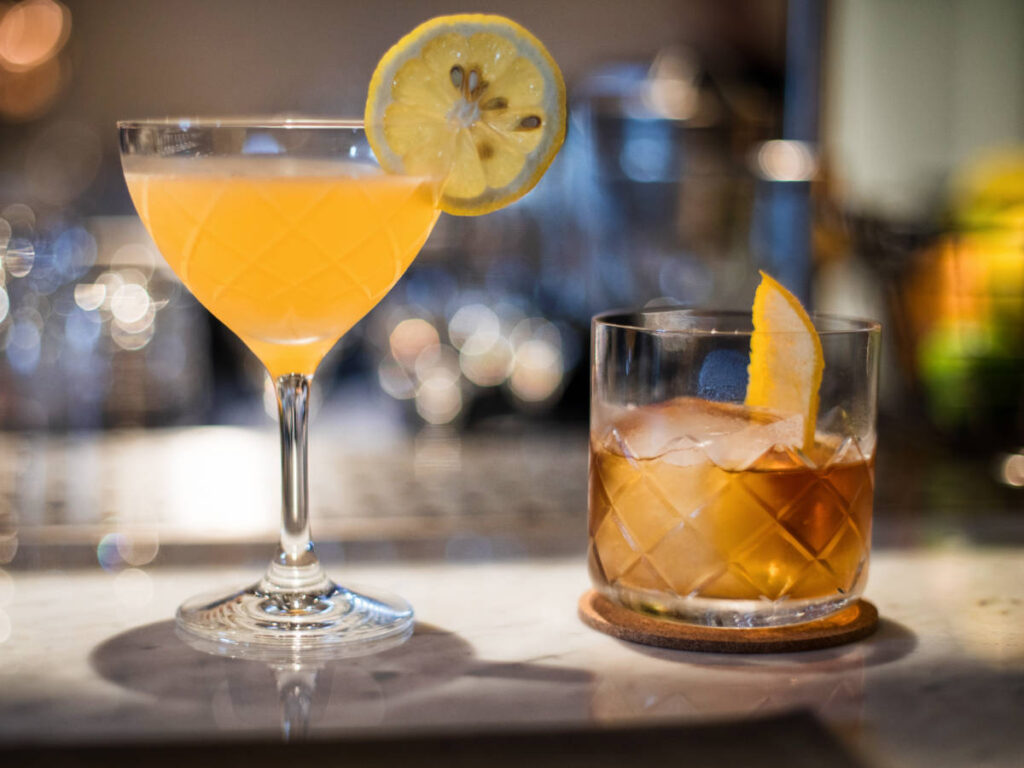 Cocktails on a bar counter in Cotton & Reed