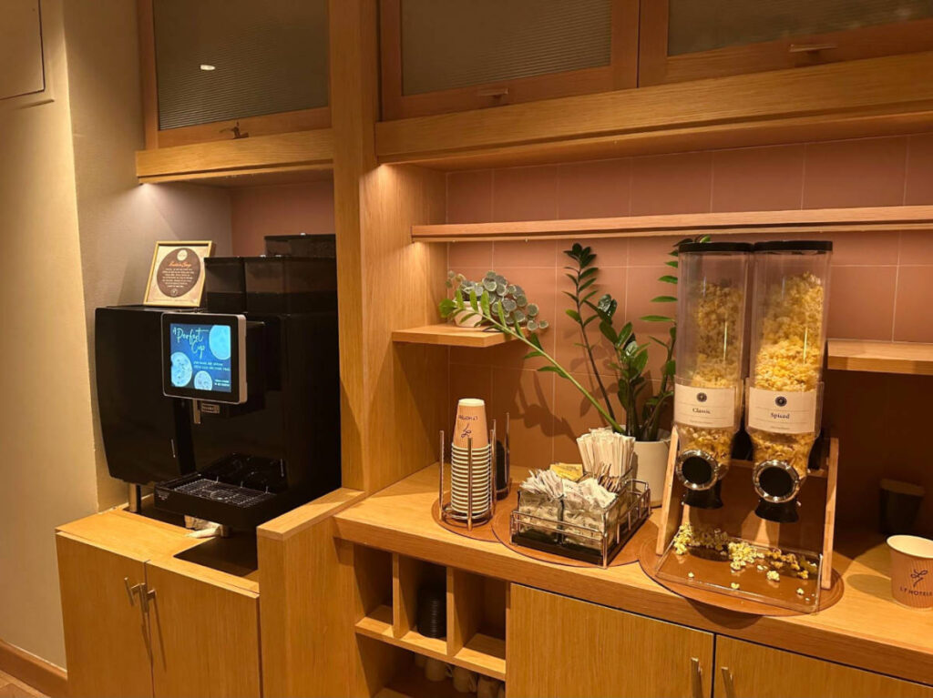A coffee station and snacks at the lobby of L7 Chicago by Lotte