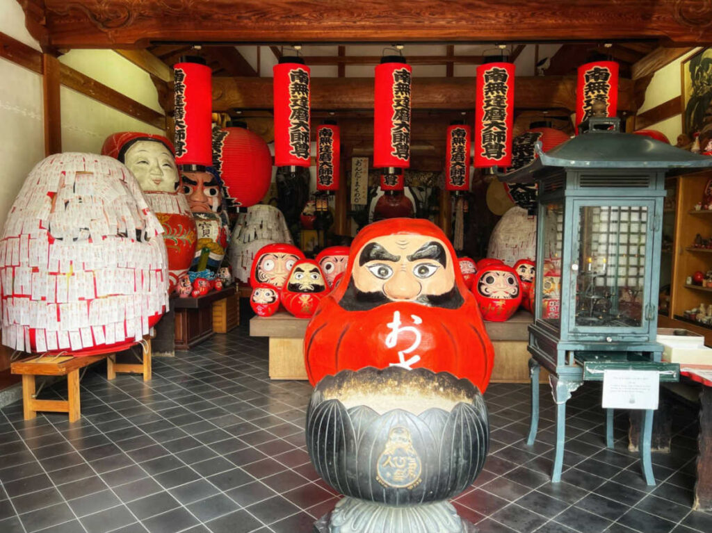 View of the eclectic collection of Daruma dolls in Horinji