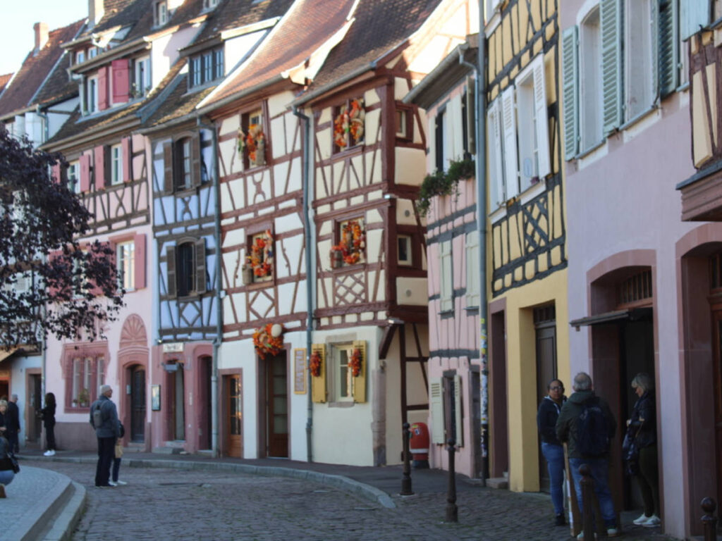 View of the colorful buildings from the street in Colmar