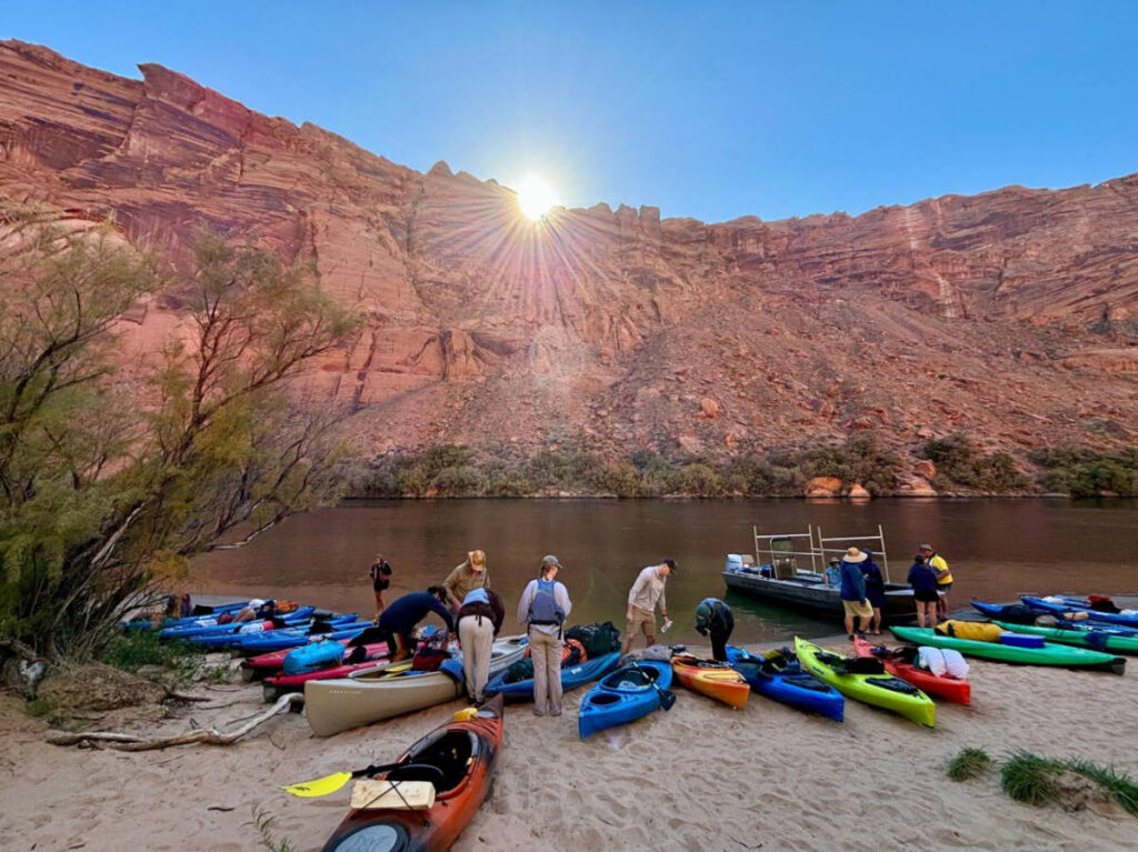 View of people with colorful Kayaks