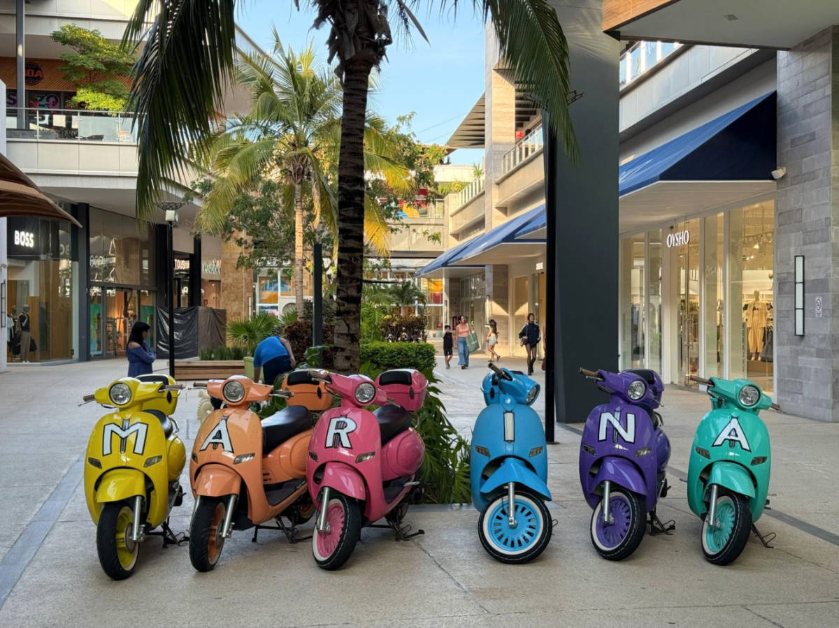 View of the lined colorful scooters at the Marina shopping center