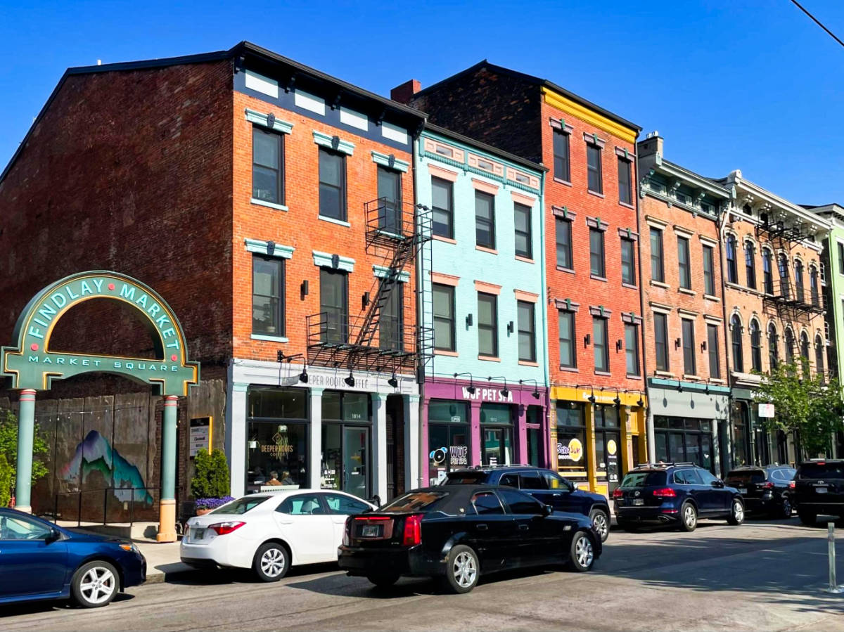 View of the colorful exterior of the shops and restaurants along Findlay Market