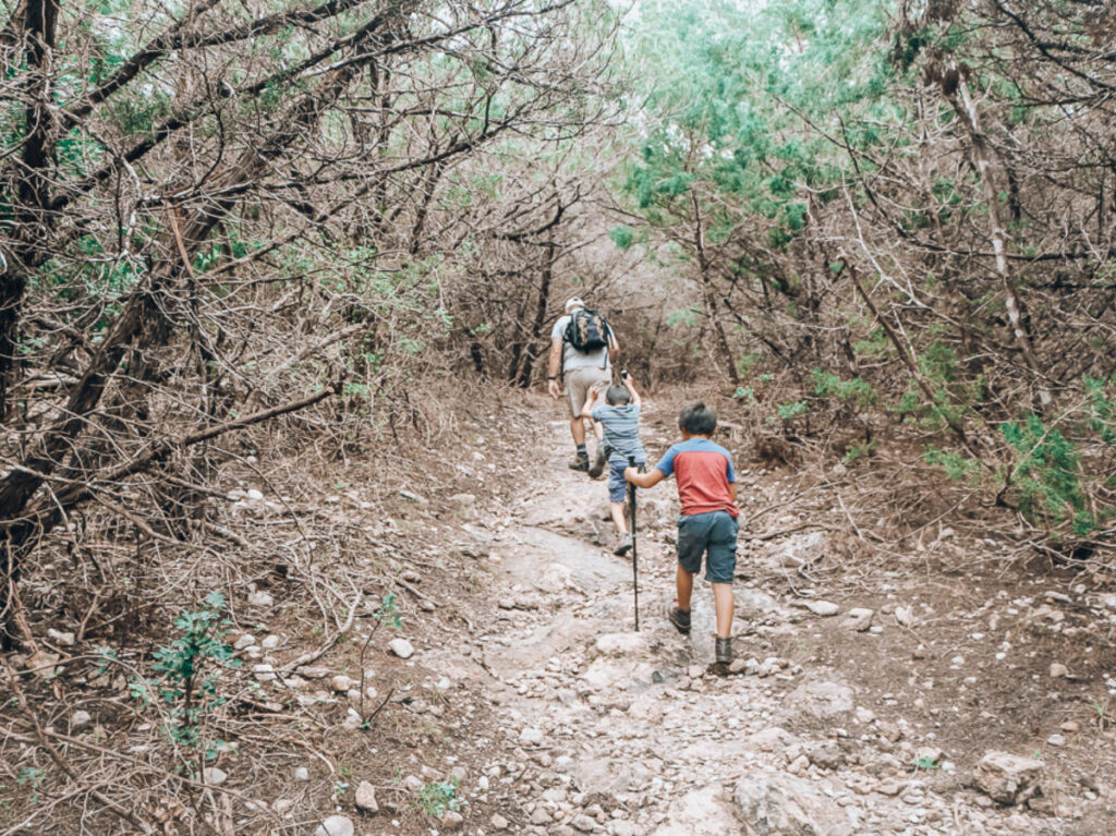A family hiking at the Comanche Lookout Park