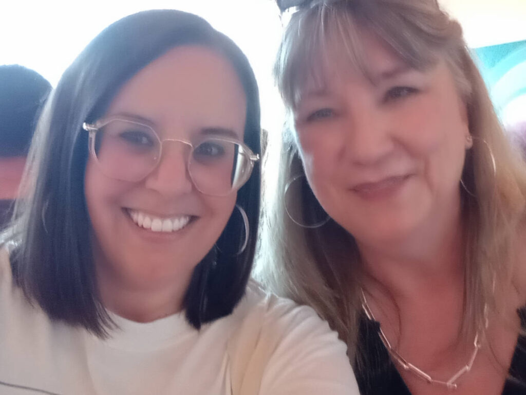 Travel Lemming writer, Catherine Driver smiling for a selfie with a woman who attended the Vancouver Community Meetup