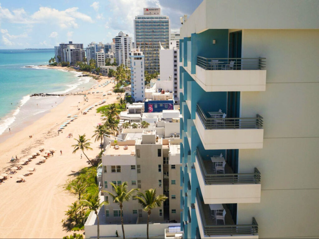 Overlooking view of the beach from a condo balcony in Condado