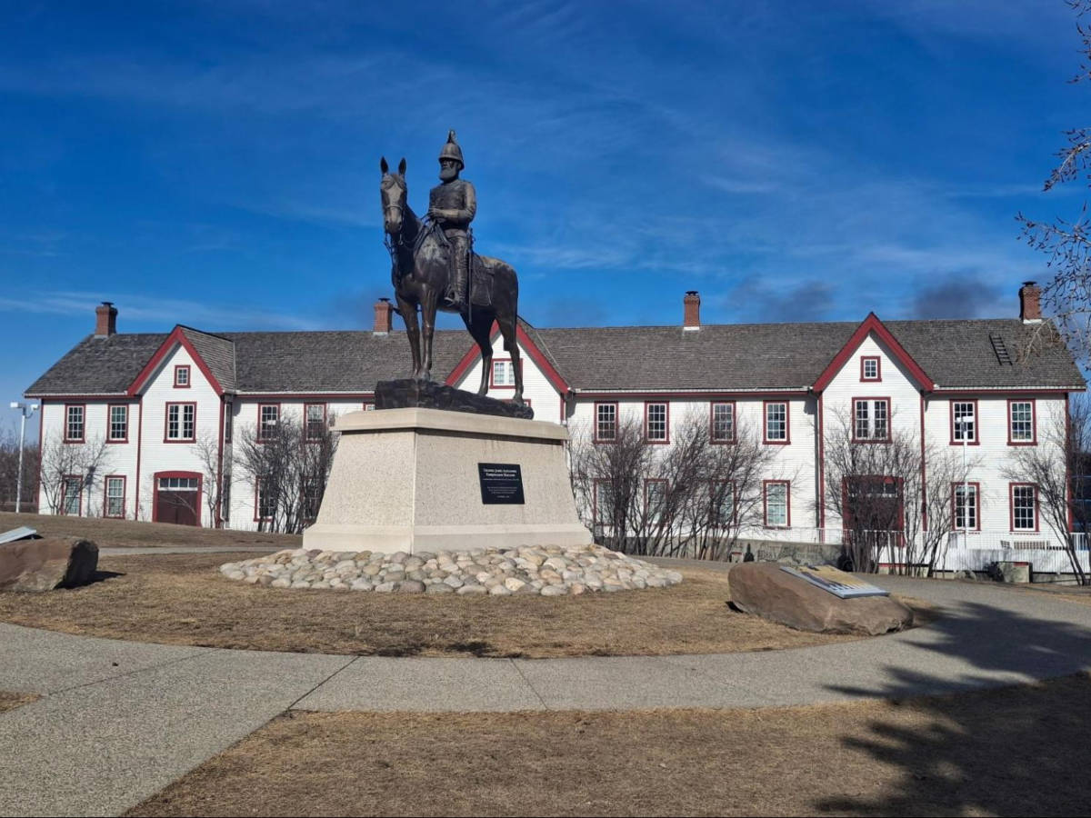 A sculpture in front of the Confluence Historic Site & Parkland