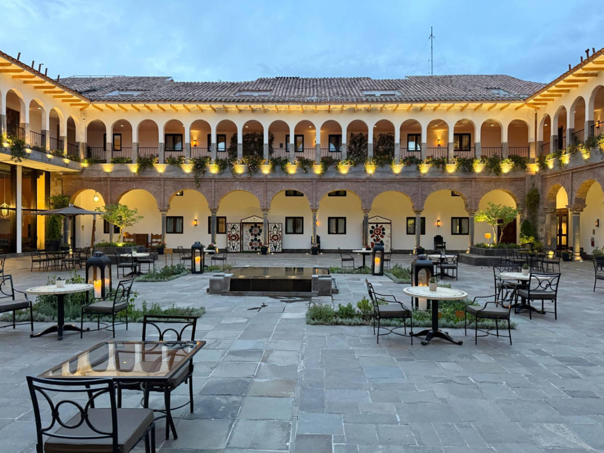 Tables and chairs at the courtyard of JW Marriott El Convento Cusco