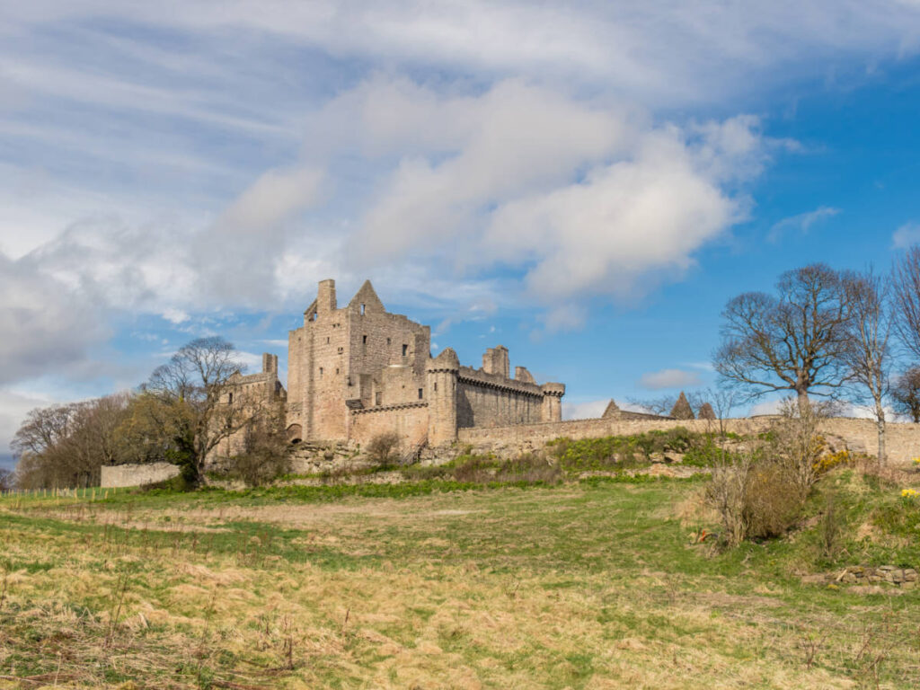 View of the remains of Craigmillar Castle from the distance