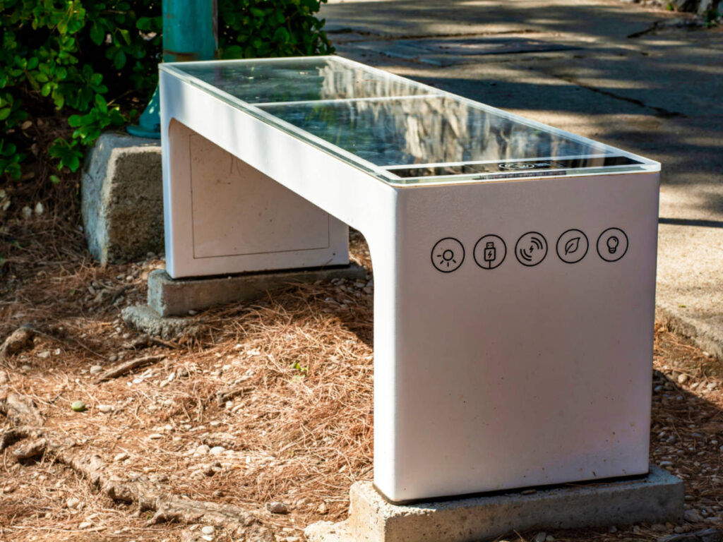 A bench with WIFI, charging station, temperature and weather sensor features