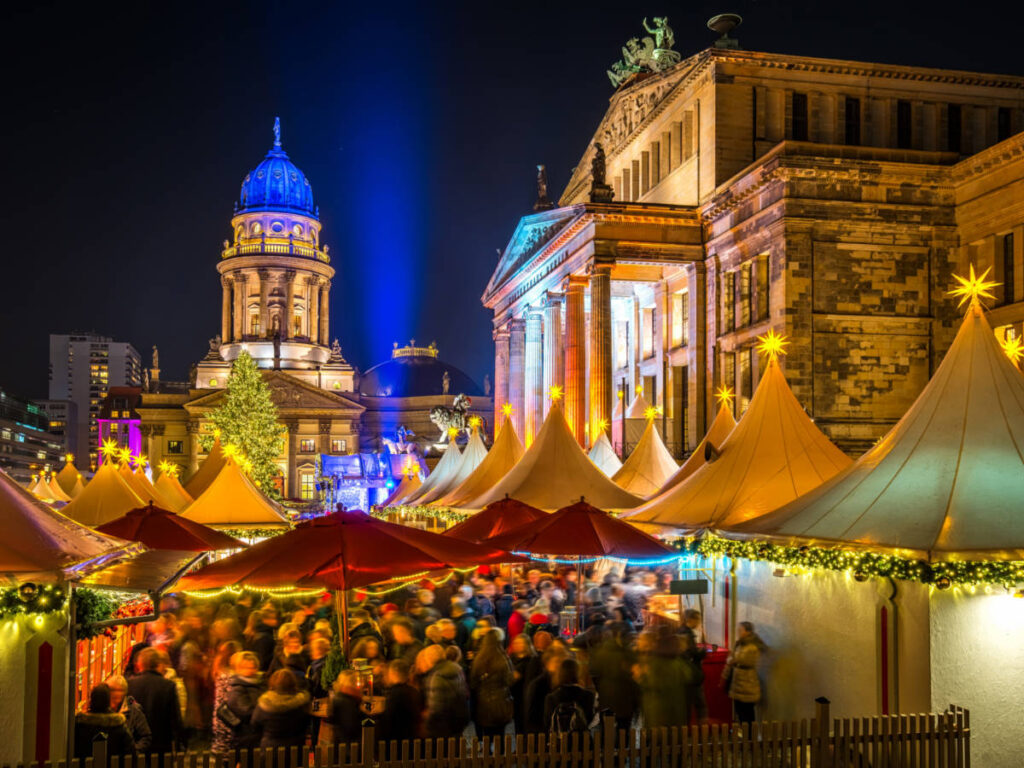 The crowd at the Gendarmenmarkt at night