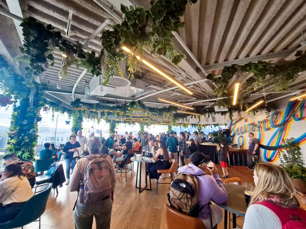 View of the crowd dining inside The Gravity Bar at Guinness Storehouse