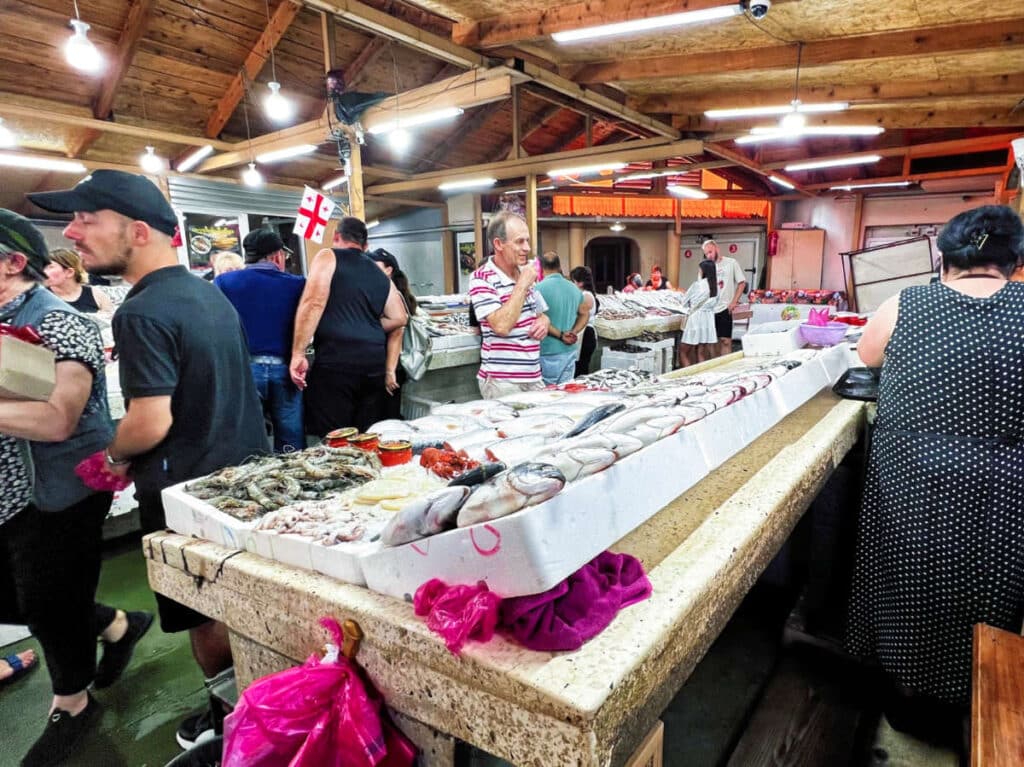 View of the people looking around the Batumi Fish Market