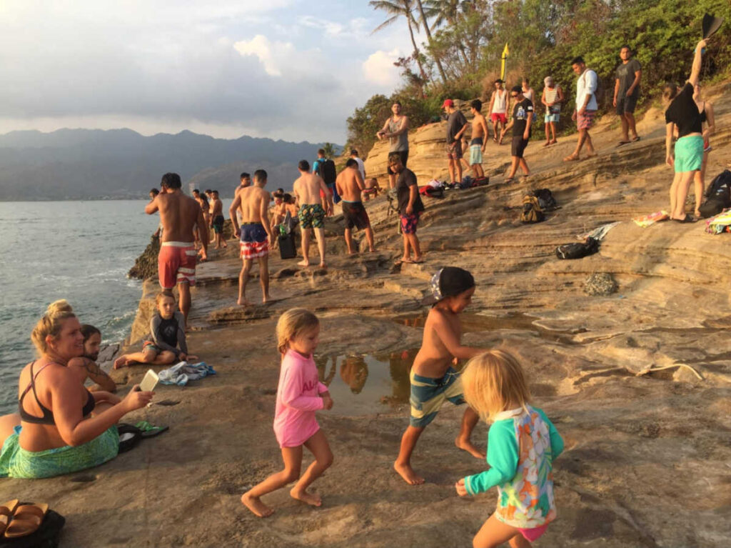 The crowd enjoying the sunset at the China Walls