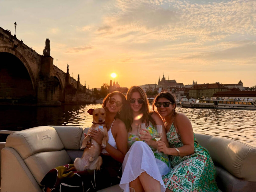 The author Meera Devotta and her friends at a sunset cruise on The Wine Boat