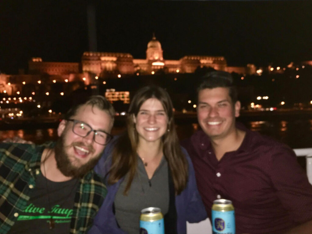Blurry photo of Travel Lemming writer Betty and friends during a Danube booze cruise