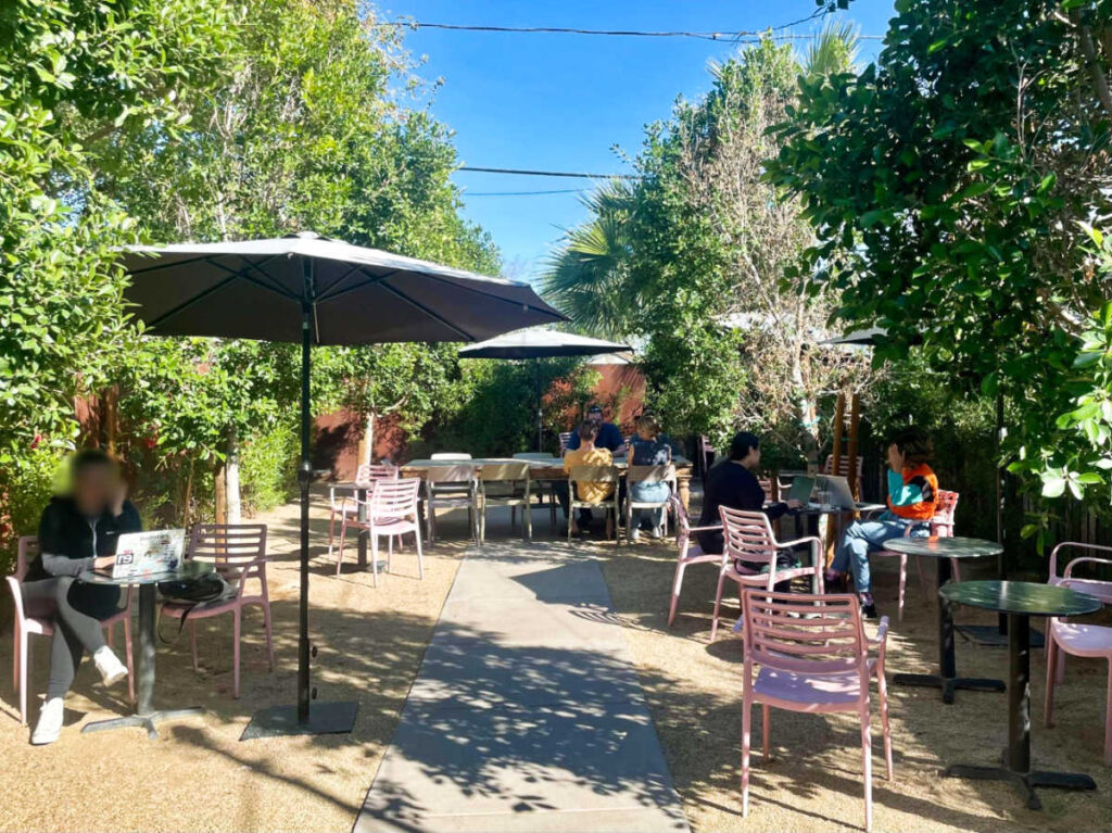 People at the outdoor seating area of Dark Hall Coffee