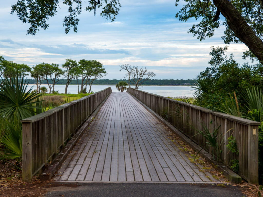A wooden bridge spans the waters on Daufuski Island