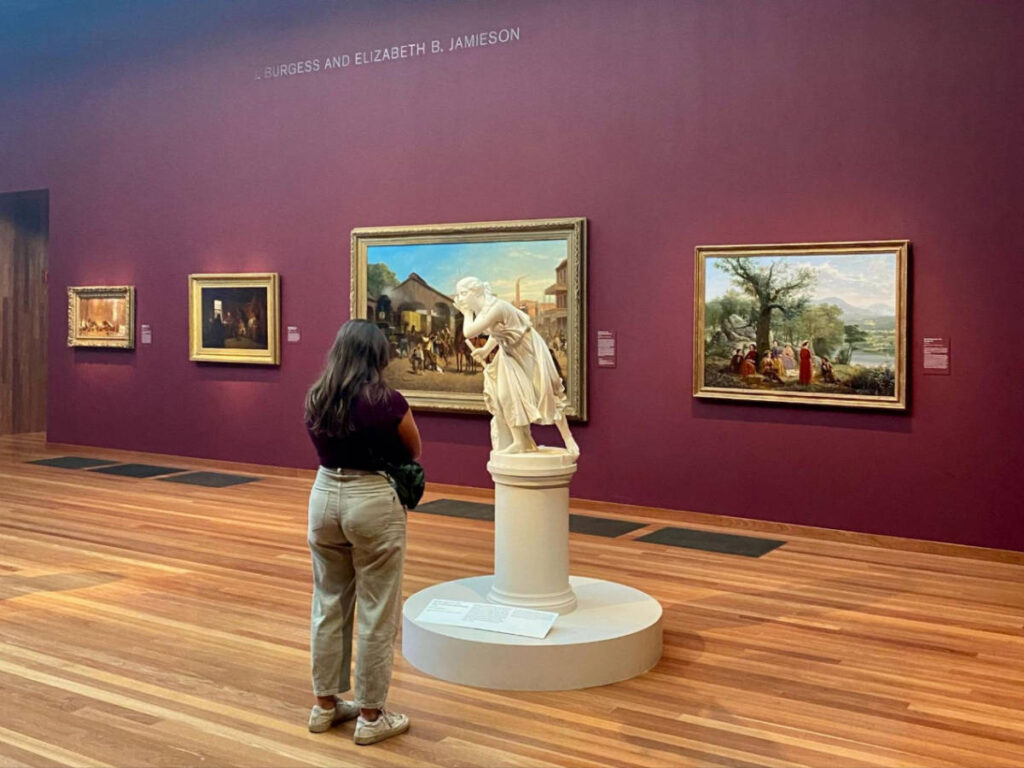The author's partner admiring a sculpture in De Young Art Museum