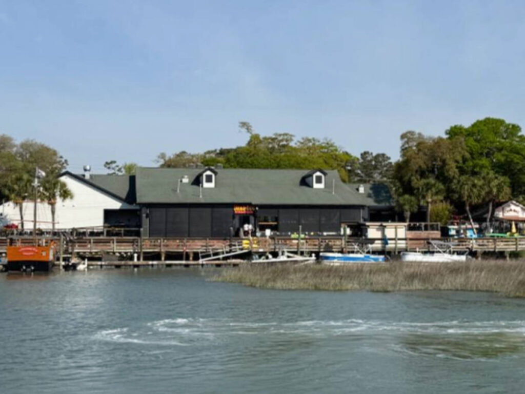 View of the Dead Dog Saloon from across the water