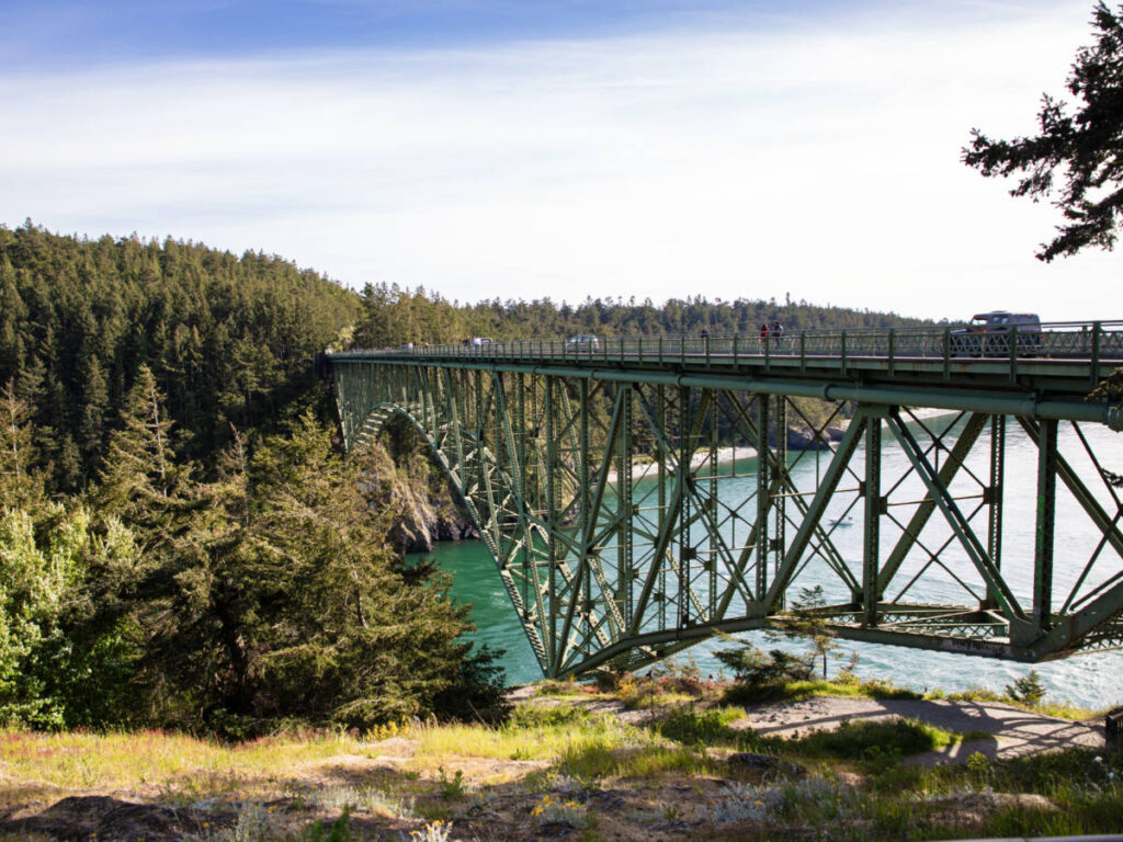 Panoramic view of the bridge surrounded by greenery at Deception Pass State Park