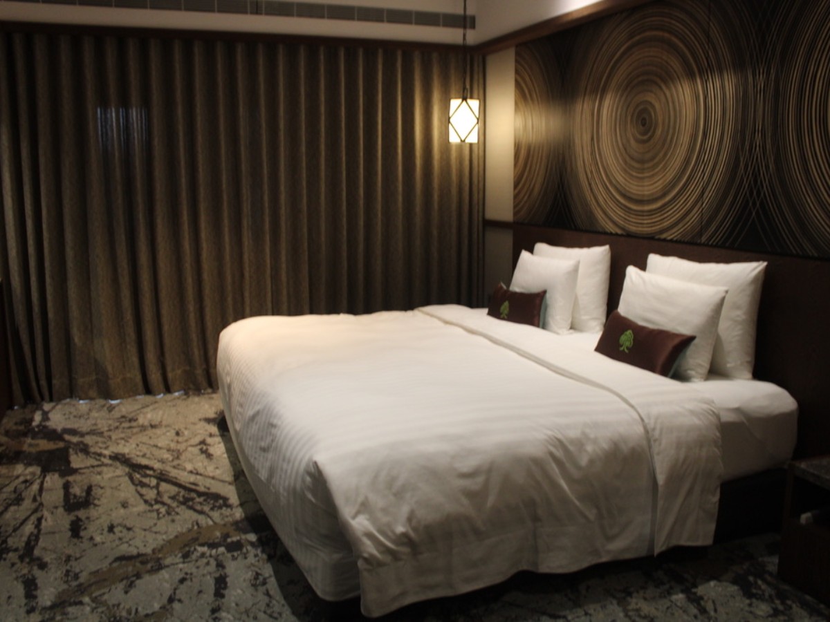 View of the Deluxe Double Room with curtain closed