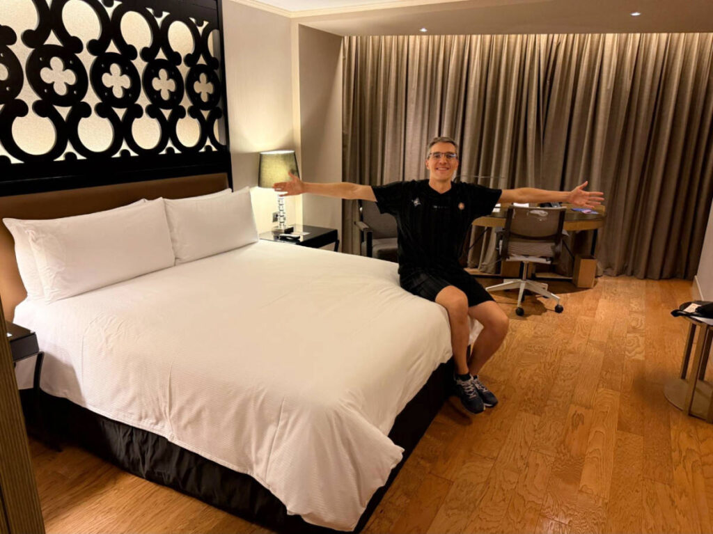 The author, Nate Hake on their bedroom at Hilton Lima Miraflores