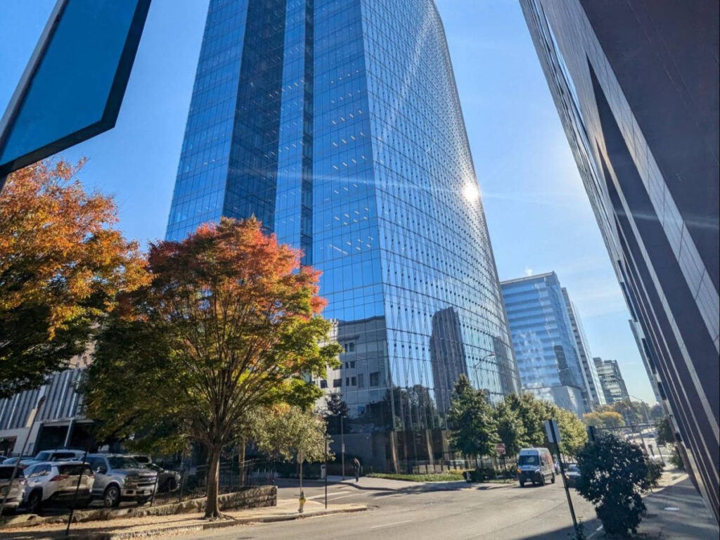 View of the fall foliage in front of the Dominion skyscrapers