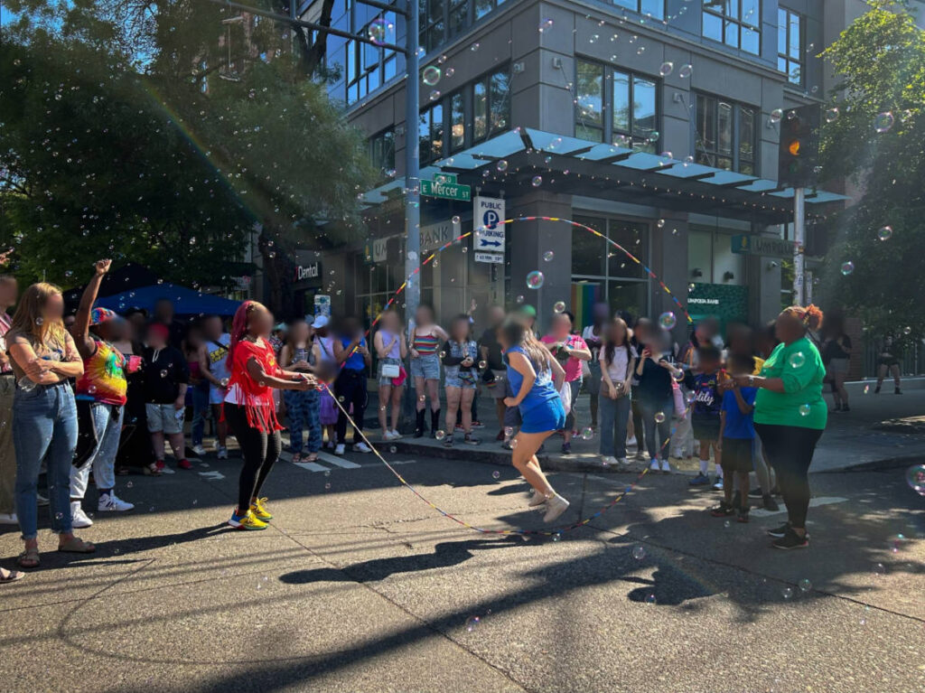 People playing Double Dutch jump rope