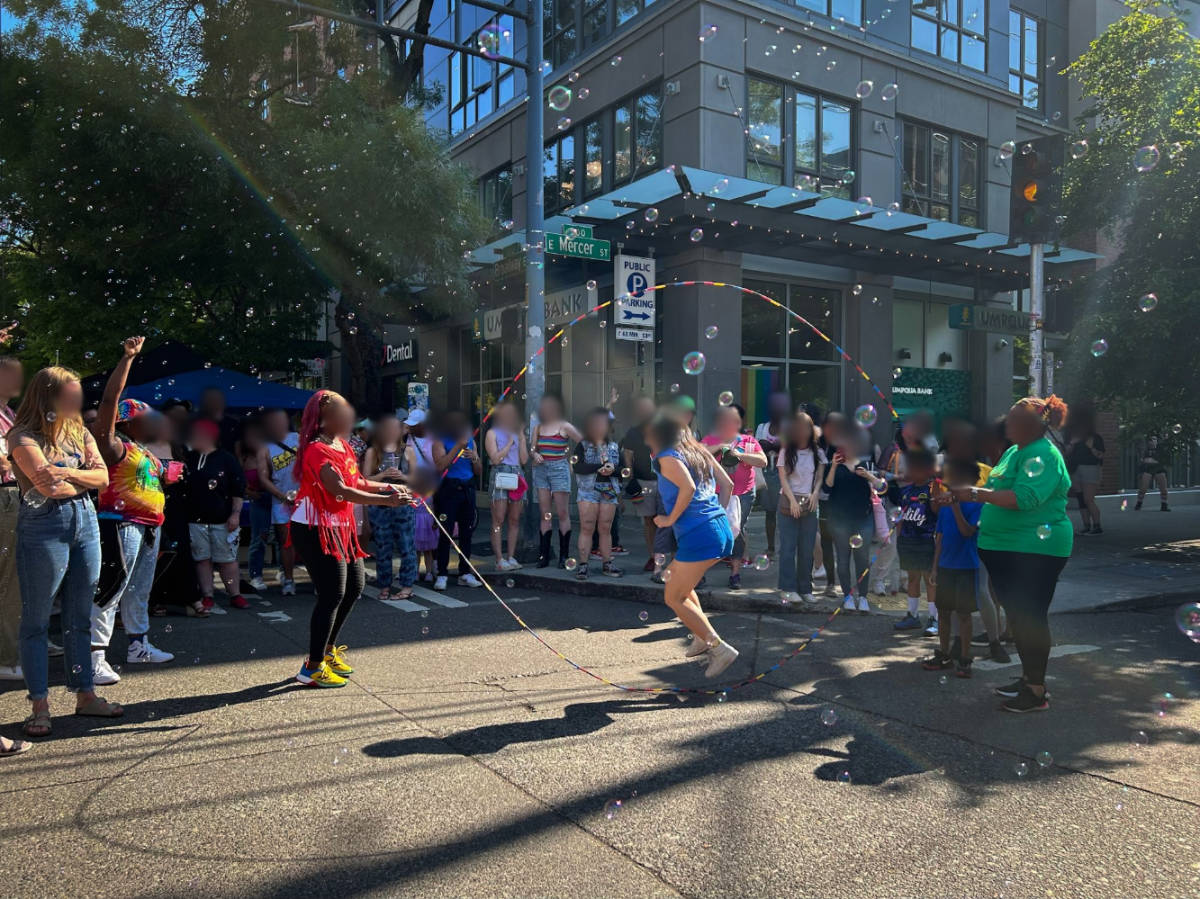 People playing Double Dutch jump rope