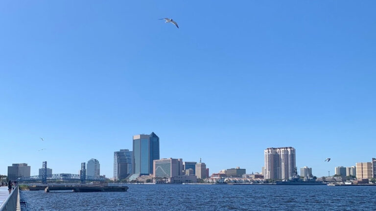 Downtown Jacksonville skyline viewed from the Southbank Riverwalk across the St. Johns River