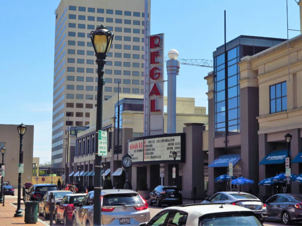 Blue sky over the vehicles and buildings in Downtown Rockville