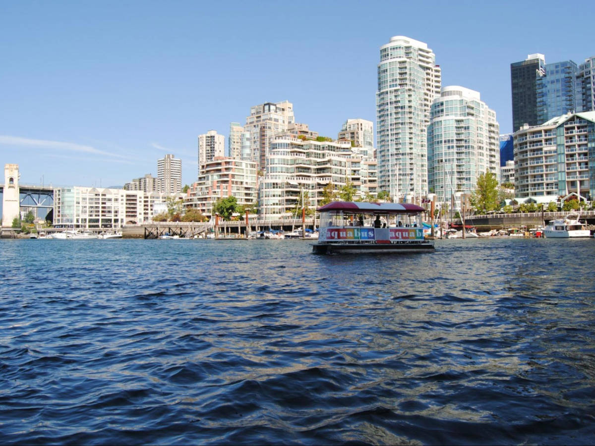 Panoramic view of the Downtown’s high-rise condos from the waters of False Creek