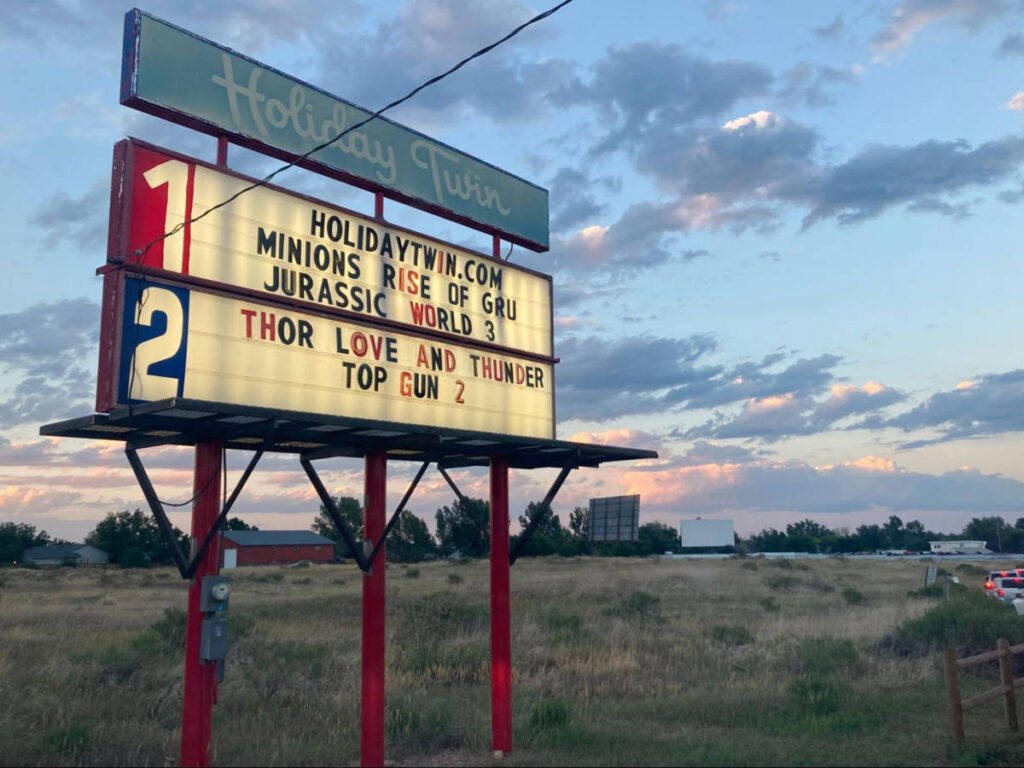 Closeup look of the signage of a drive-in movie theater