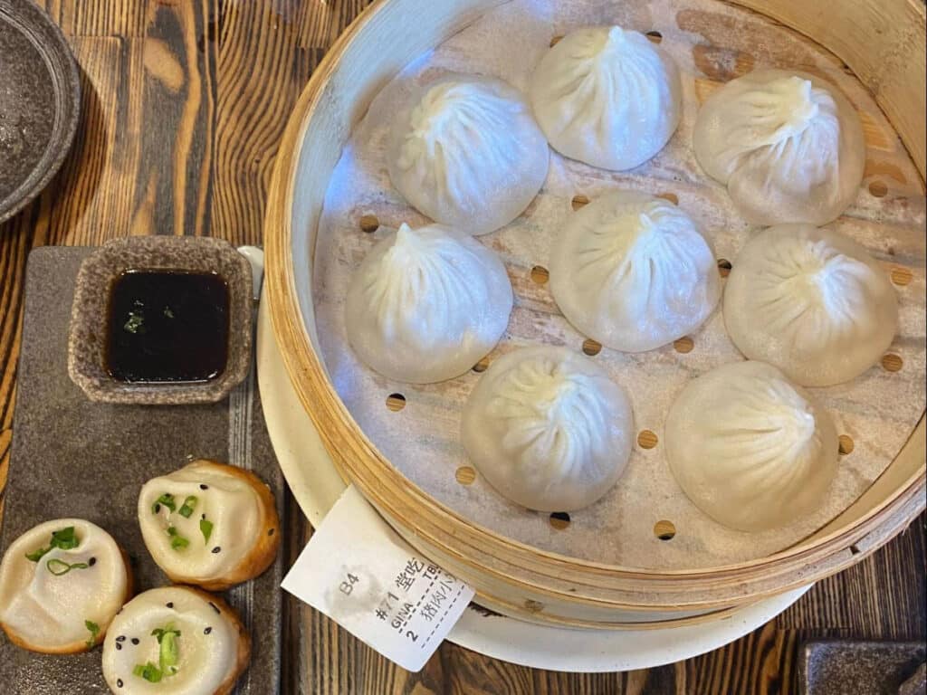 Pork xiao long bao served in Dumpling Home
