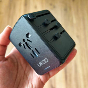 A hand holding the EPICKA Universal Adapter