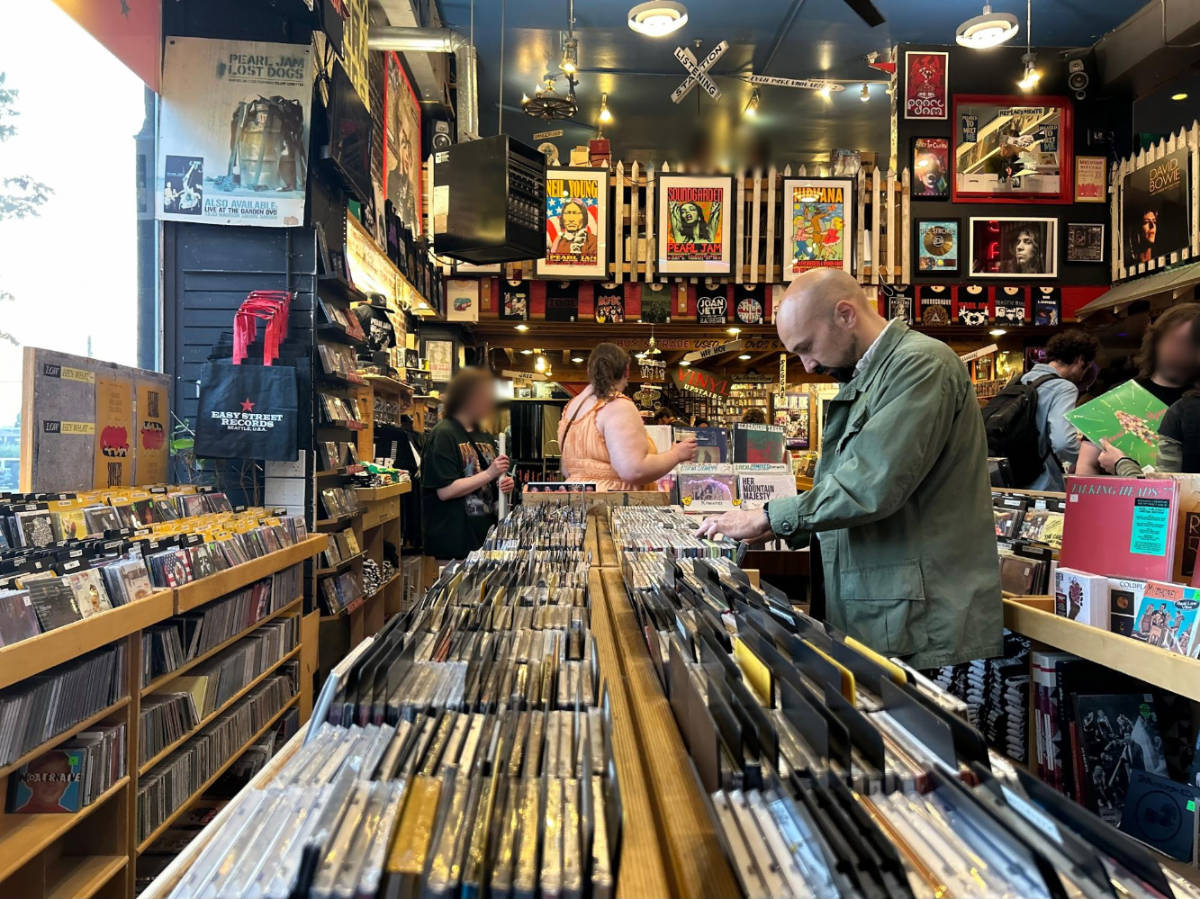 The author's husband browsing records and CDs in Easy Street