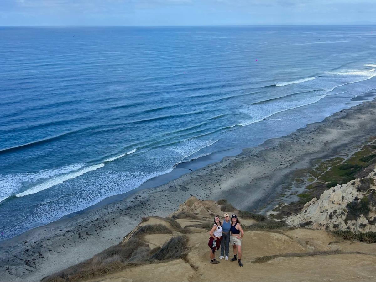 Editor Laura and friends on a cliff while hiking down to La Jolla’s beaches